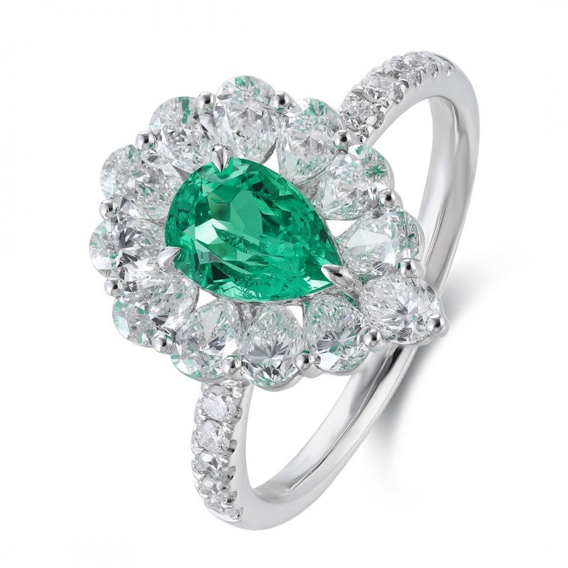 emerald or diamond engagement ring